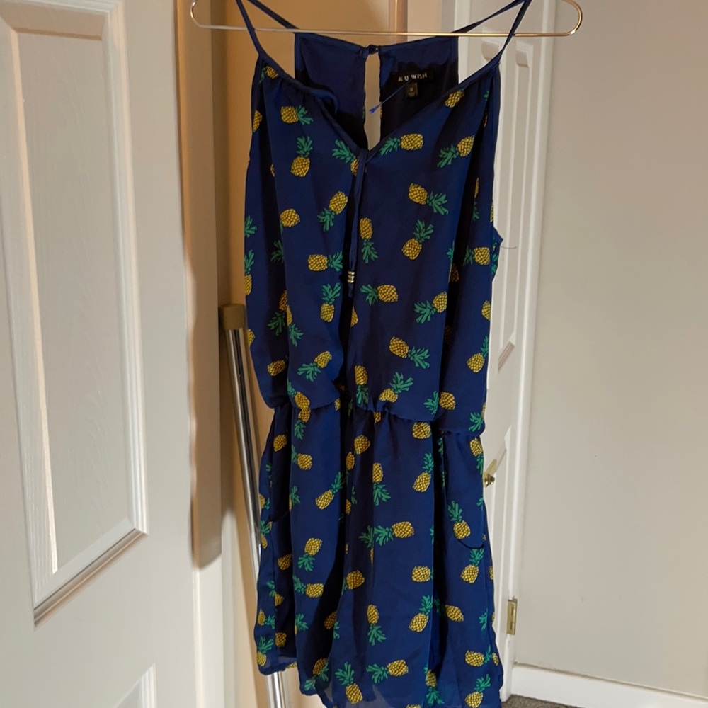 Navy blue romper with pineapples